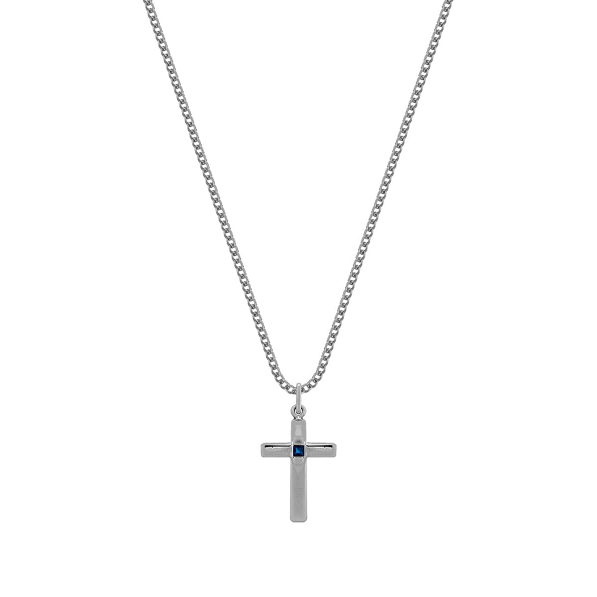 Cadena minimalista de plata 925 con dije de cruz y piedra preciosa, hecha a mano en Colombia.